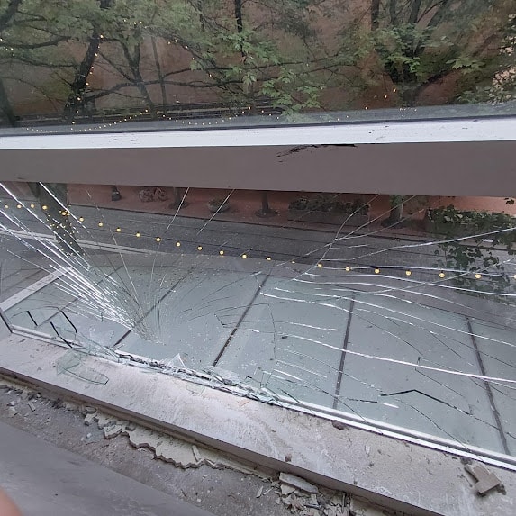 Fox Tower curtain wall before — broken glass unit